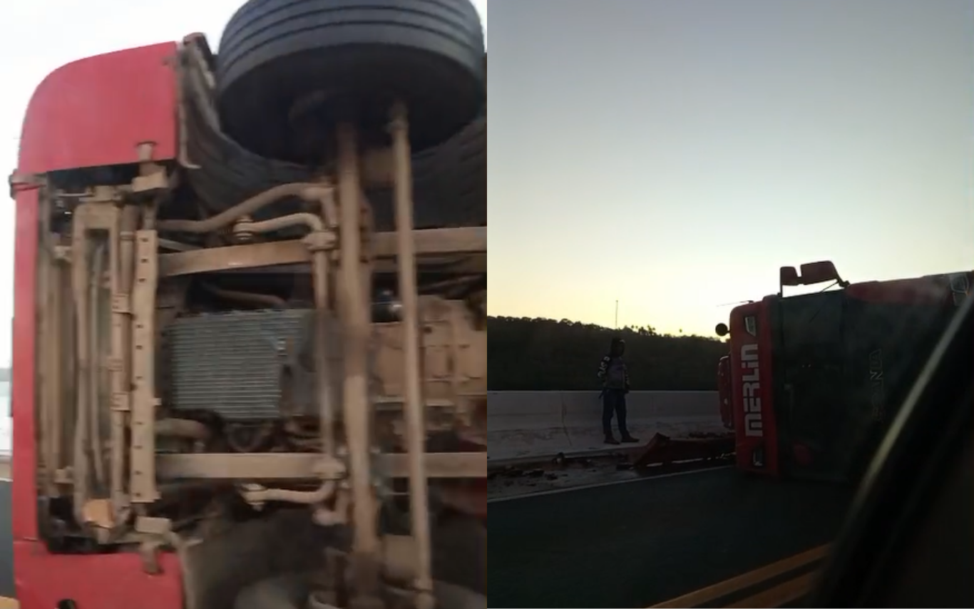 Caminhão carregado com cerveja tomba na MGC-452 e mobiliza equipes de resgate na ponte do Rio Araguari